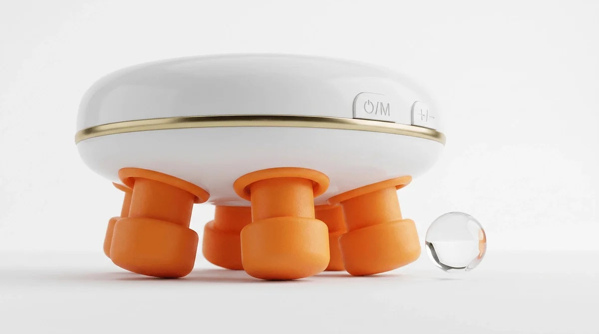 Macro detail of the medical-grade silicone massage nodes on a handheld eye device.
