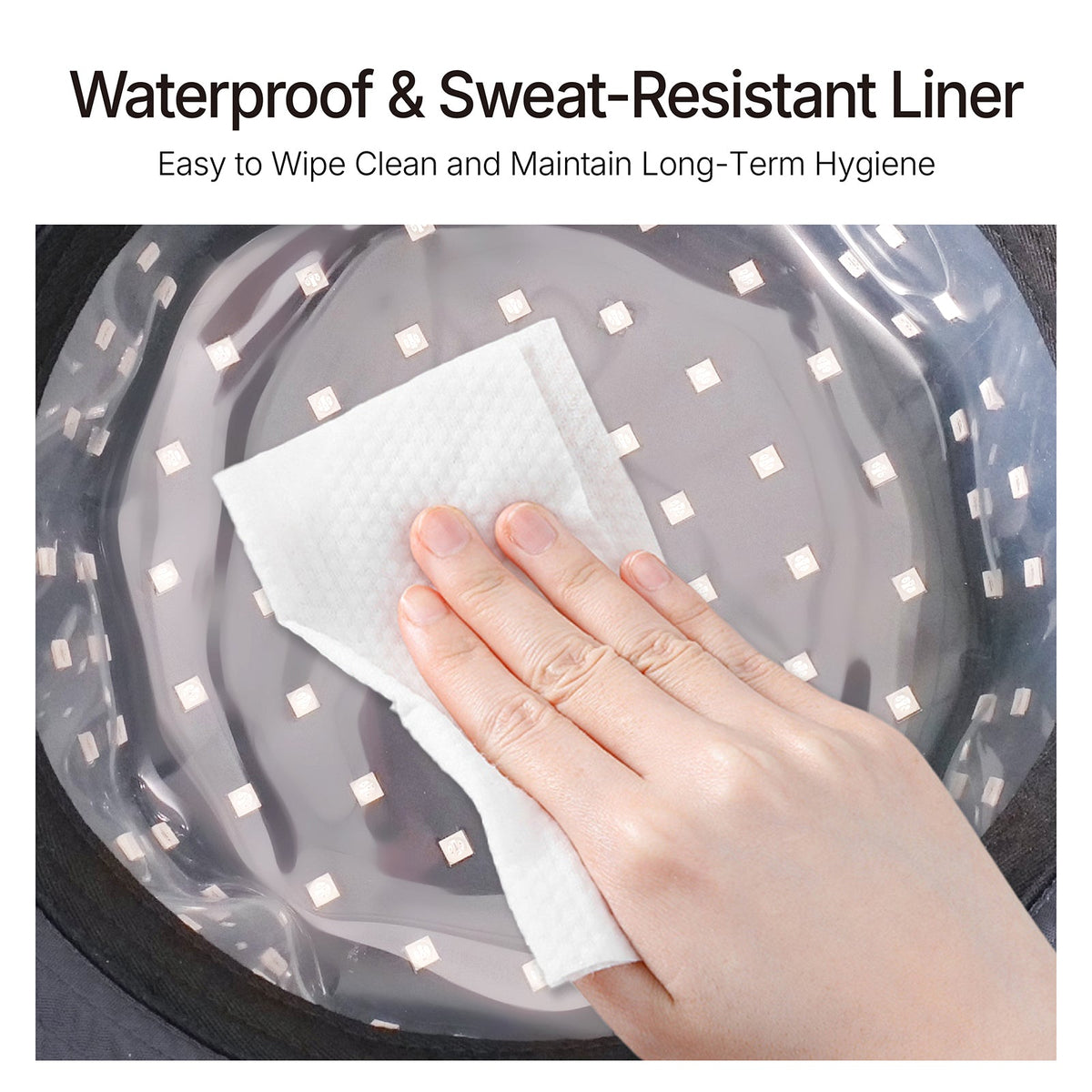 Hand wiping and cleaning transparent optical shield inside flexible red light therapy cap