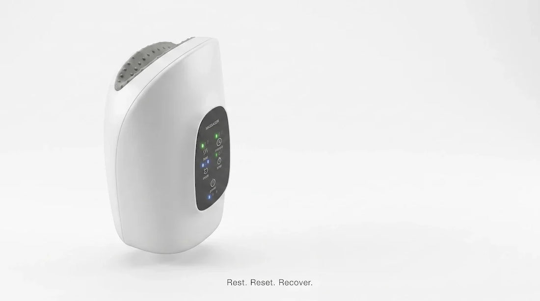 Minimalist white Elevaure hand massager floating on clean studio background.