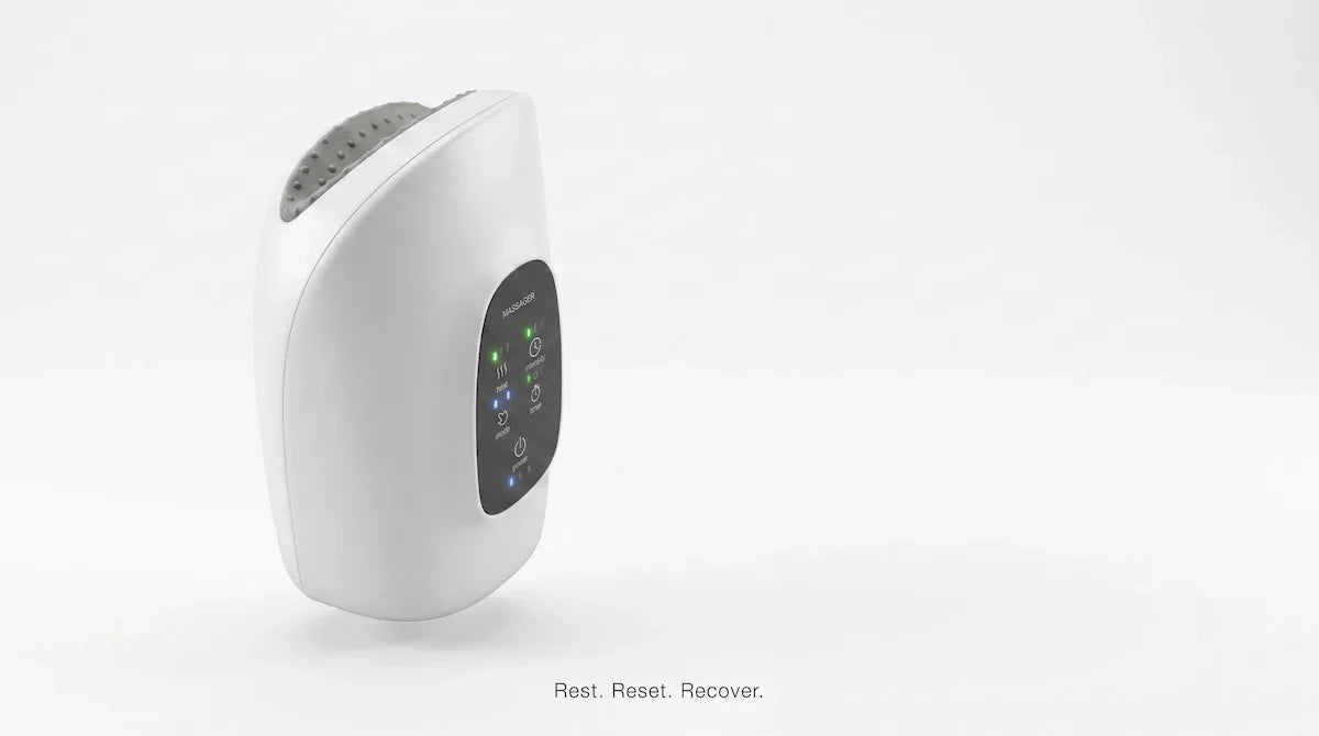 Minimalist white Elevaure hand massager floating on clean studio background.