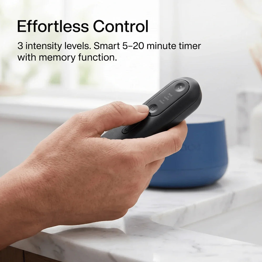 Handheld remote controller of the Elevaure LED wrap showing buttons and timer display.