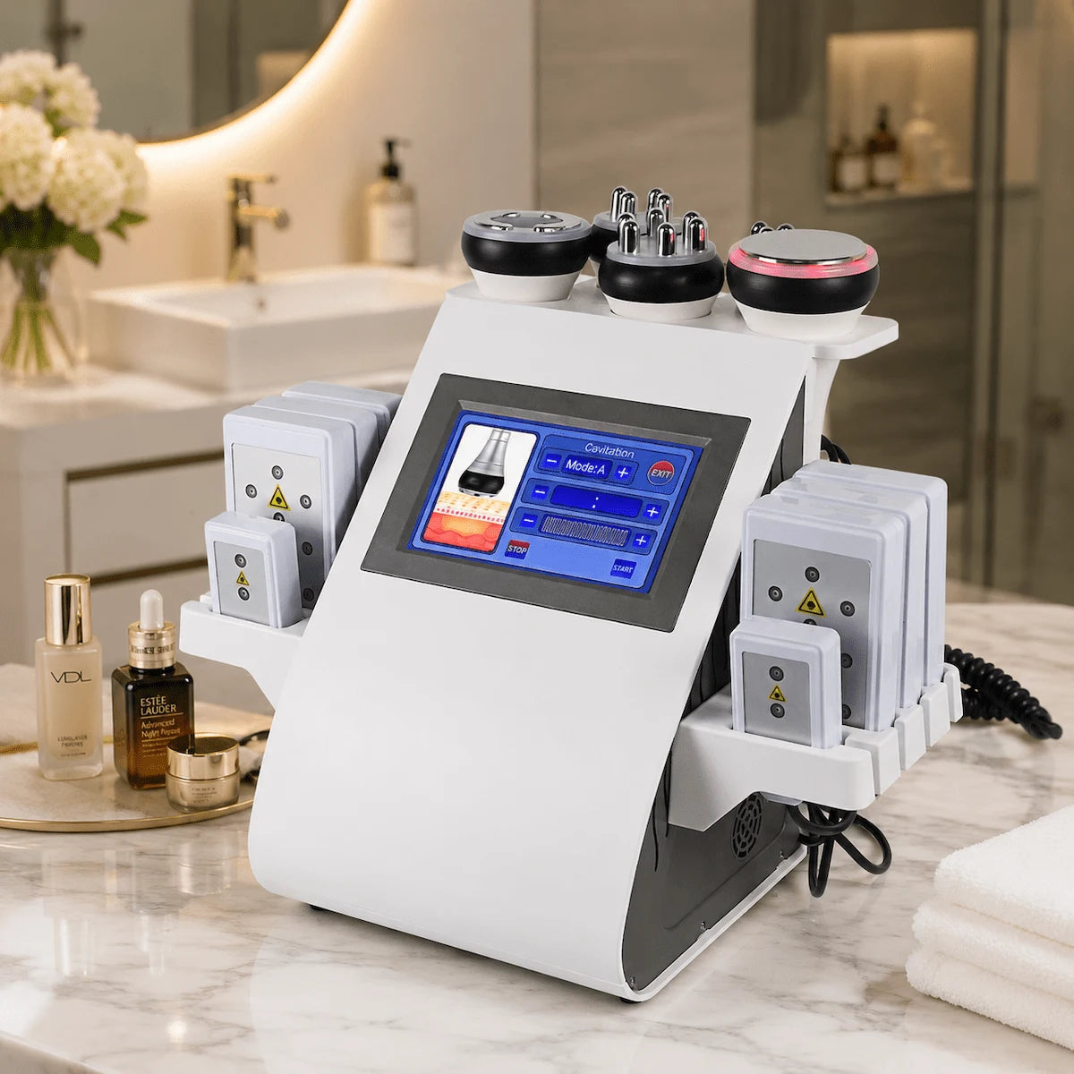 The 6-in-1 body sculpting machine set up on a clean, modern bathroom vanity.