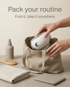 Foldable elevaure heated eye massager being packed into tote bag