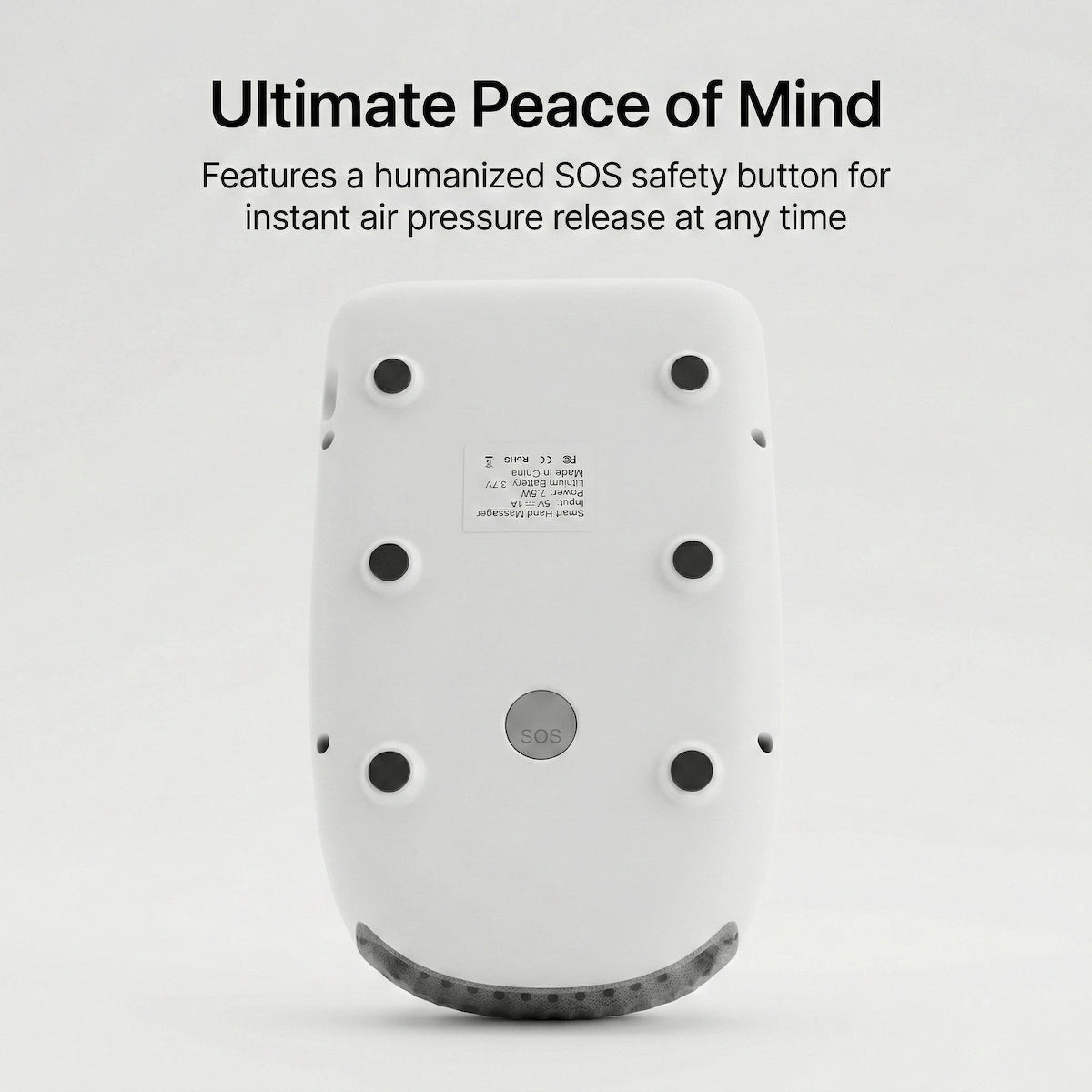 The bottom view of the Elevaure hand massager showcasing the humanized SOS safety button for instant air pressure release.