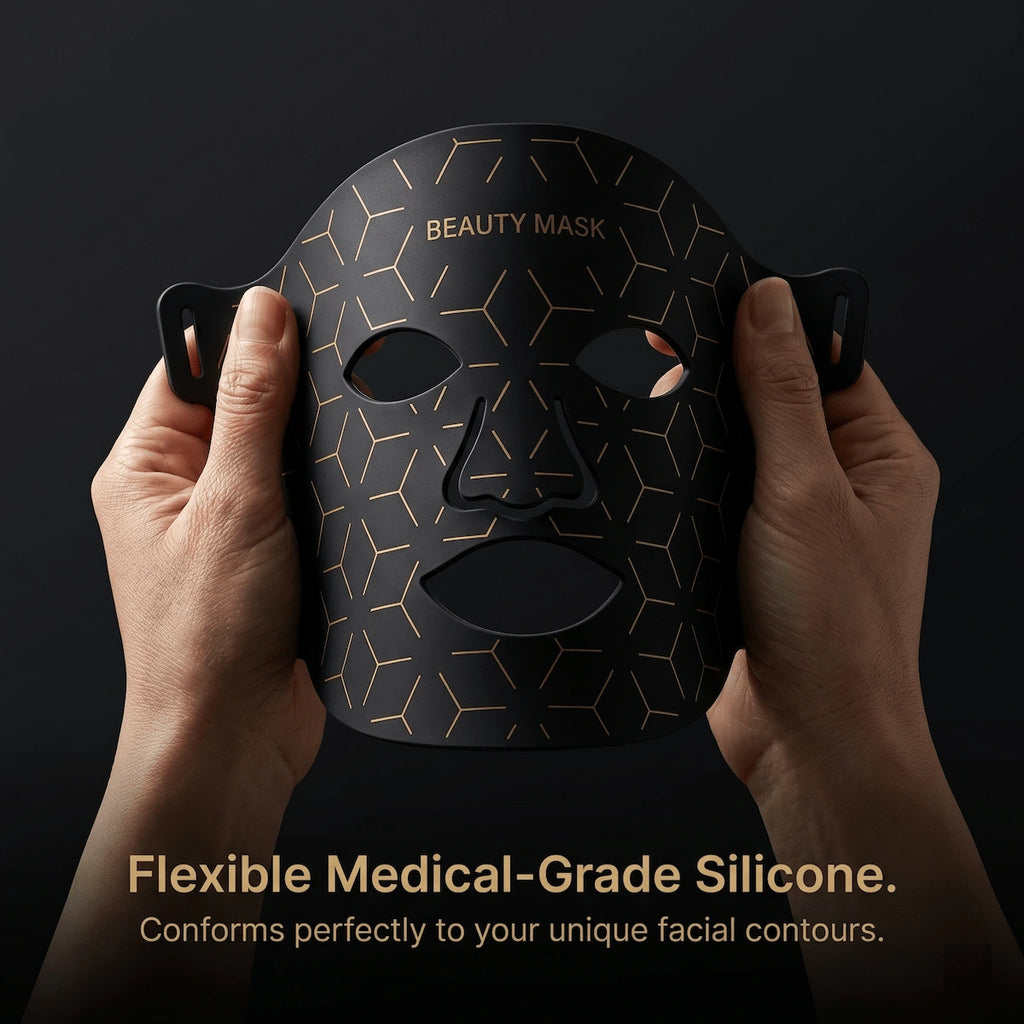 Close-up of a hand gently bending the Elevaure LED mask, demonstrating its soft, flexible medical-grade silicone material.
