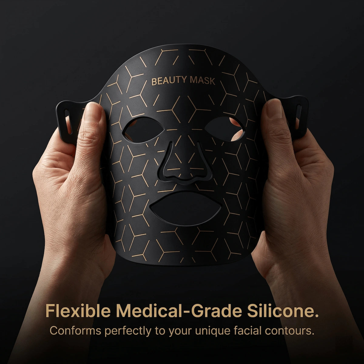 Close-up of a hand gently bending the Elevaure LED mask, demonstrating its soft, flexible medical-grade silicone material.