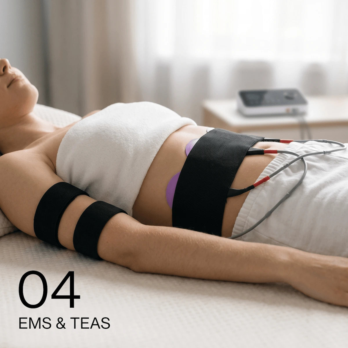 Step 4 of the body contouring protocol: hands-free EMS and TENS therapy with silicone electrode pads secured to the abdomen — demonstrating the correct pad placement for 8-channel EMS waveform sessions.