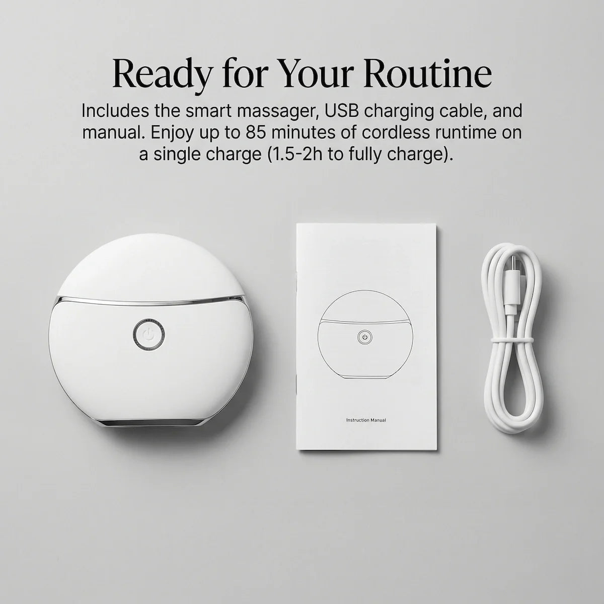 REVITALIZE™ 4-in-1 Electric Gua Sha Massager unboxing showing the device, USB charging cable, and instruction manual.