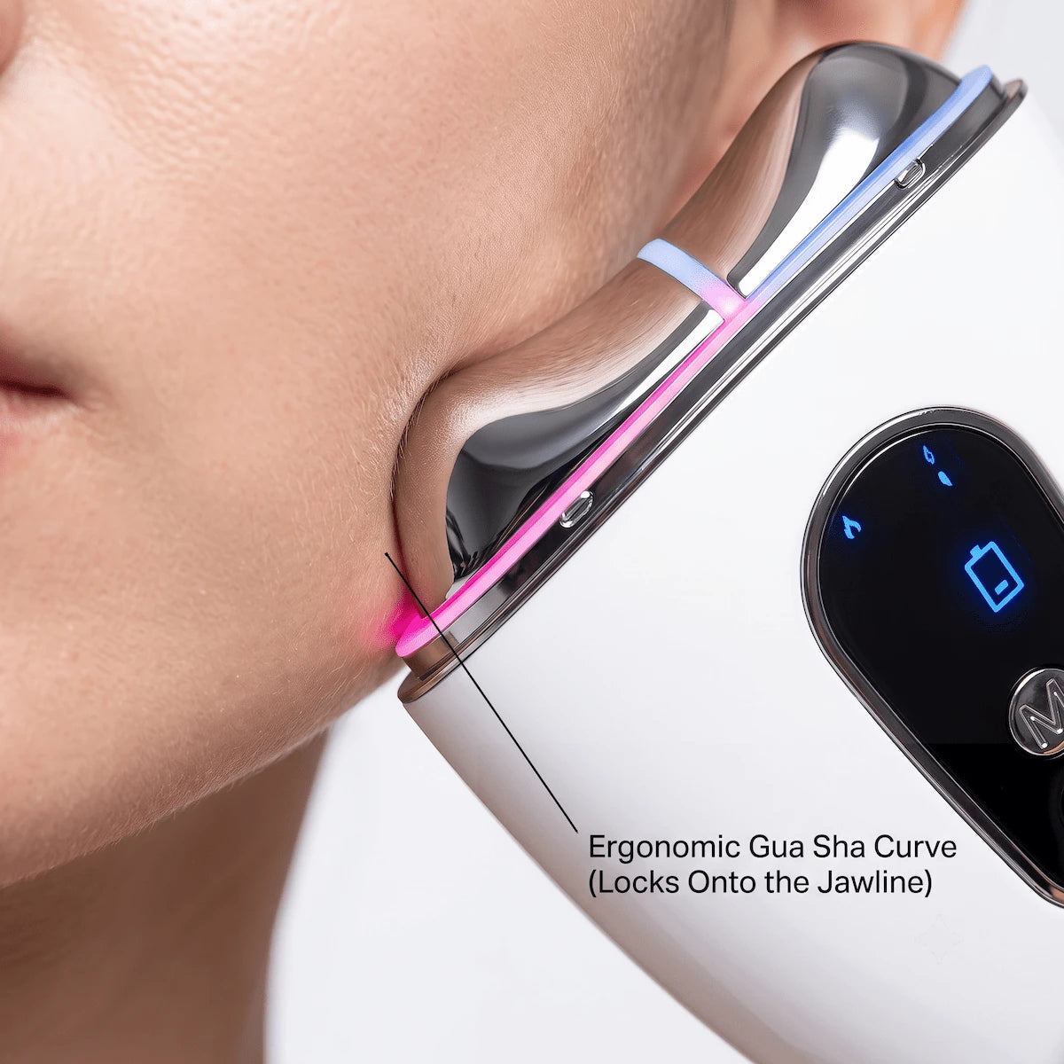 Close-up of the Elevaure device's ergonomic curve perfectly fitting a jawline for precise EMS and cryotherapy delivery.