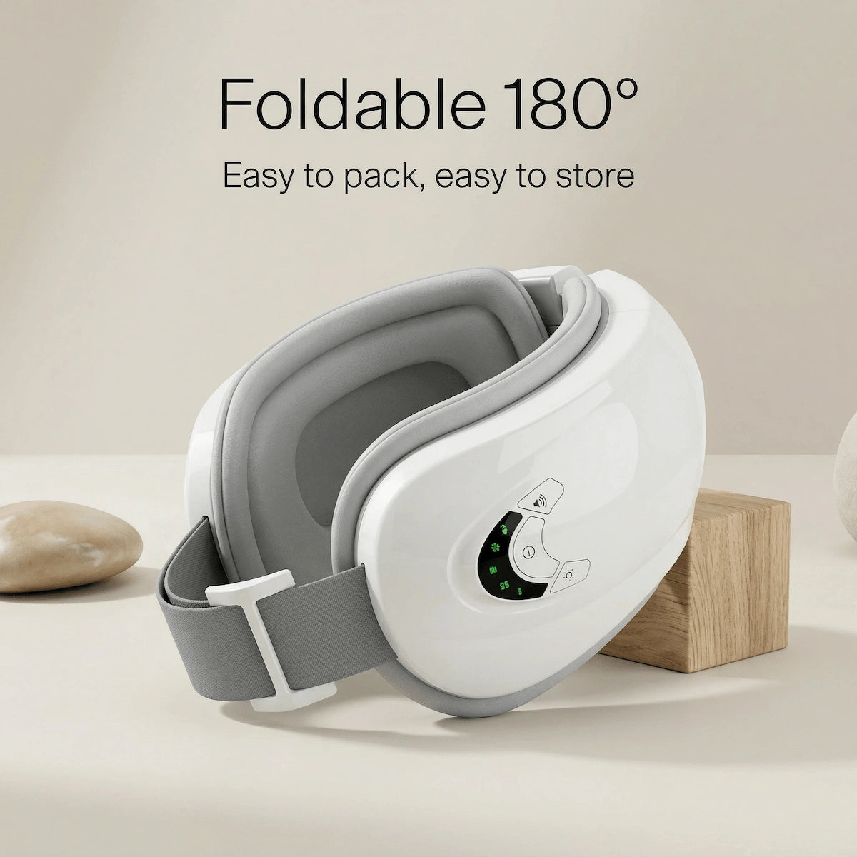 Foldable 180-degree portable eye massager design.