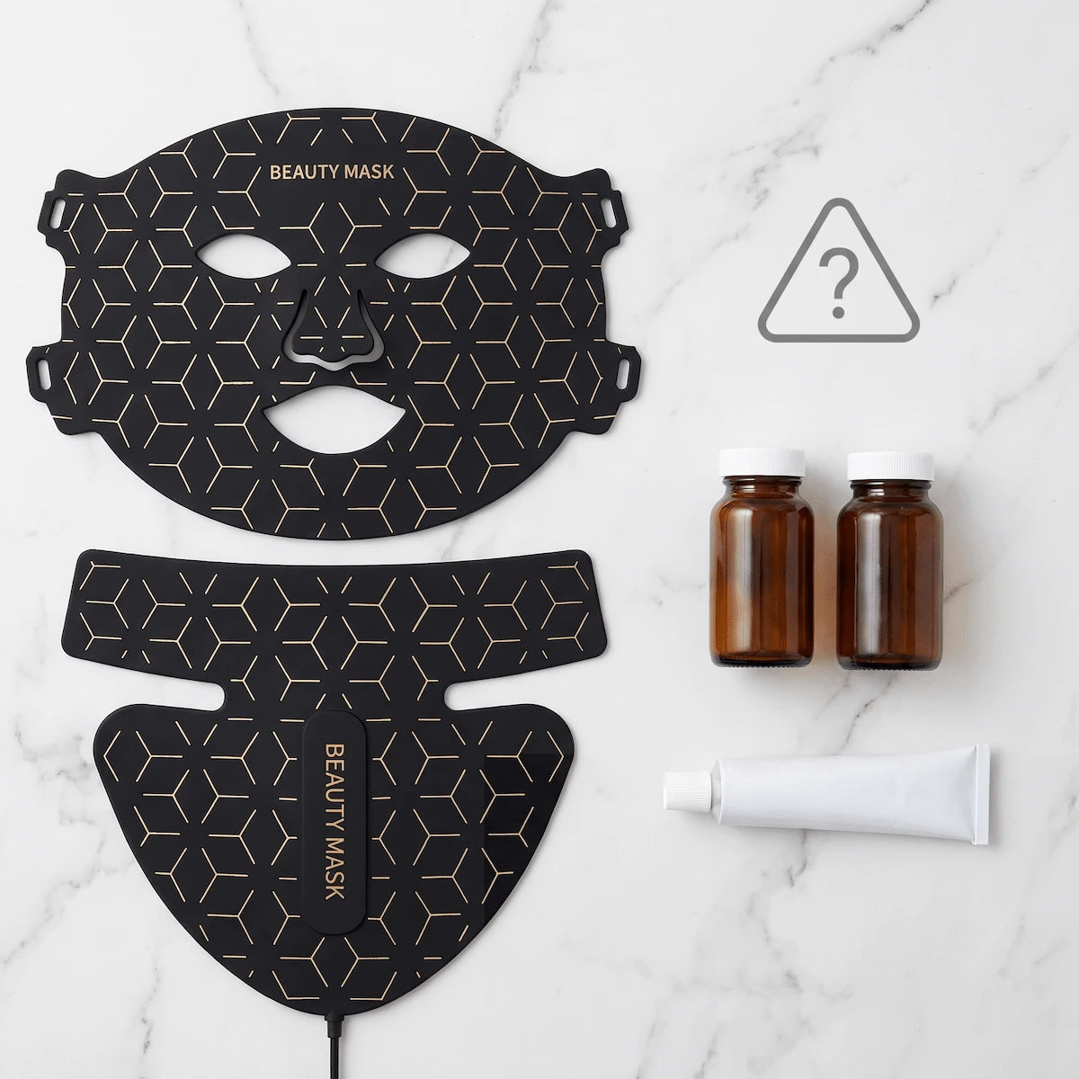 Flat lay showing an LED face mask next to prescription bottles, representing the need to check for photosensitizing medications.