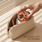 Packing the cordless and portable neck firming and double chin reducer into a luxury leather makeup pouch for travel.