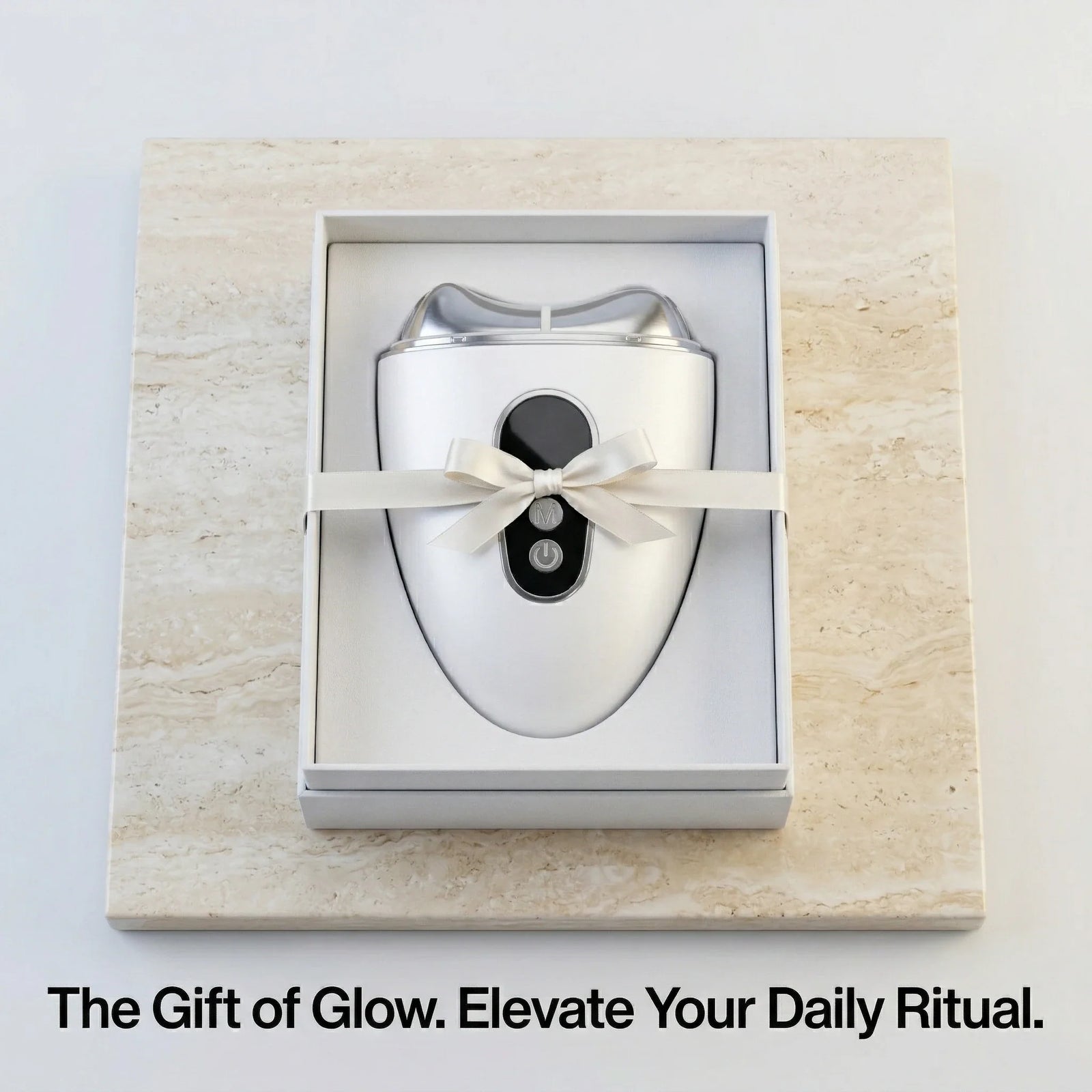 The ELEVAURE sculptor elegantly displayed inside a premium matte black gift box with a ribbon.