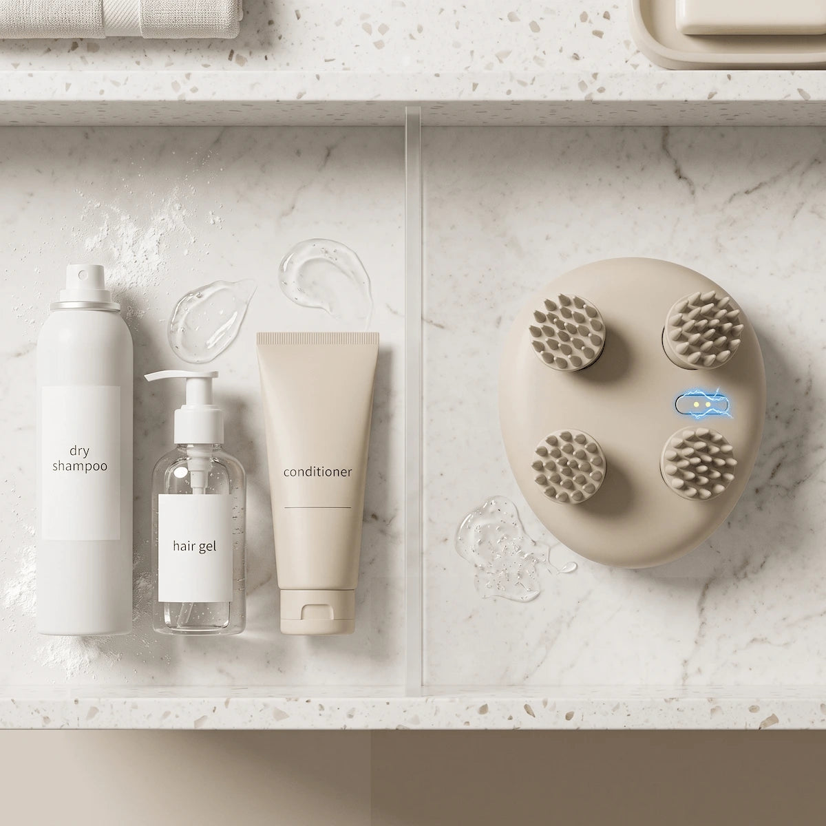 Flat lay showing an electric scalp massager next to dry shampoo and styling products, highlighting its use for buildup removal.