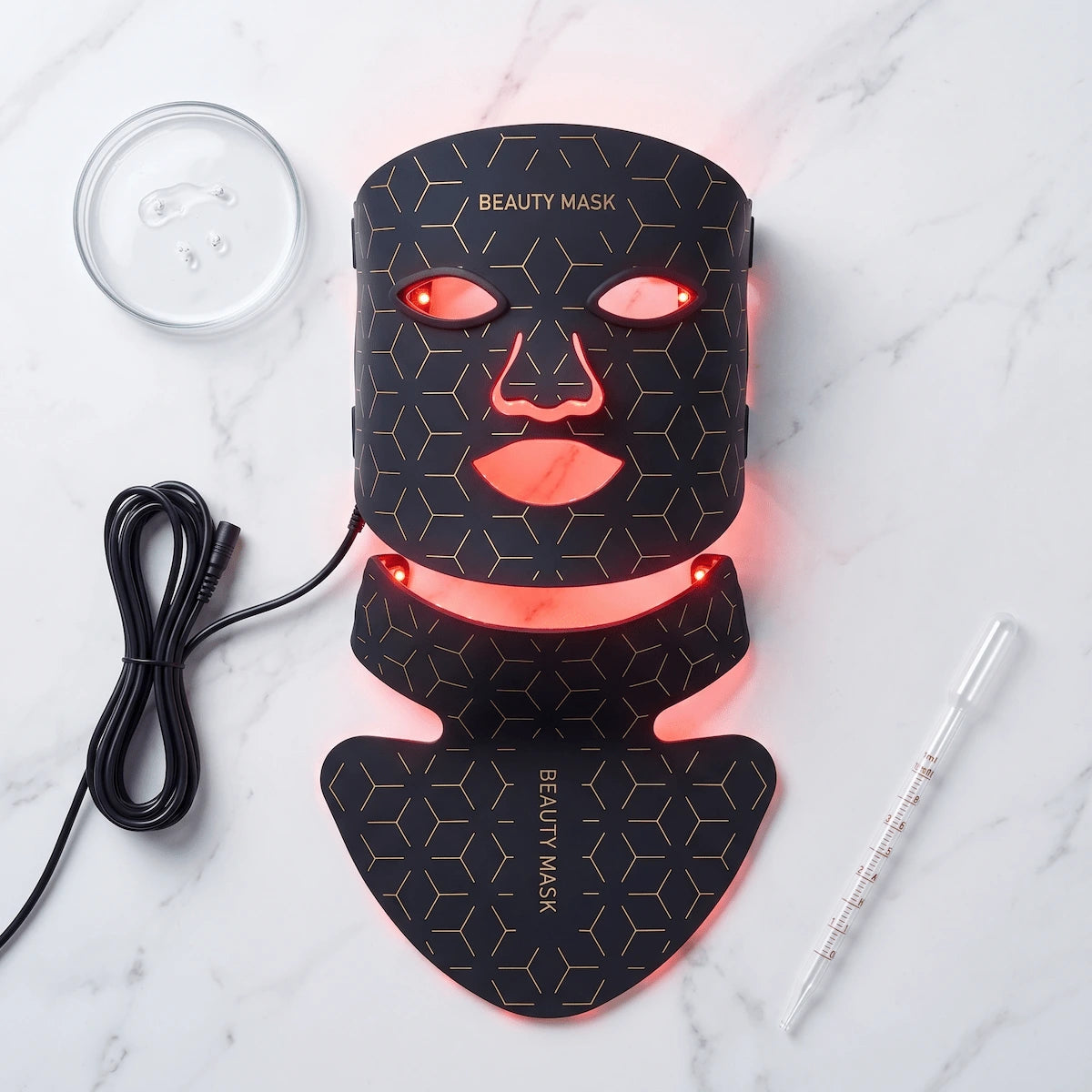 Silicone LED mask emitting 630nm red light on a minimalist background